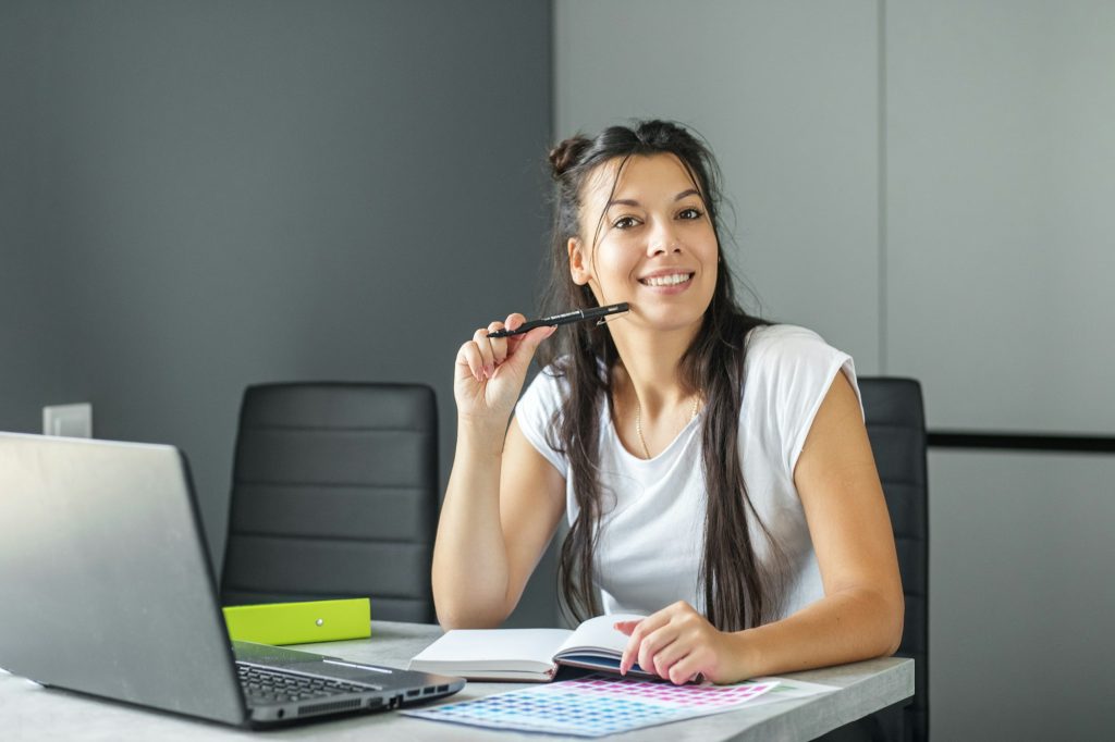 Office worker. Business woman working in the office.