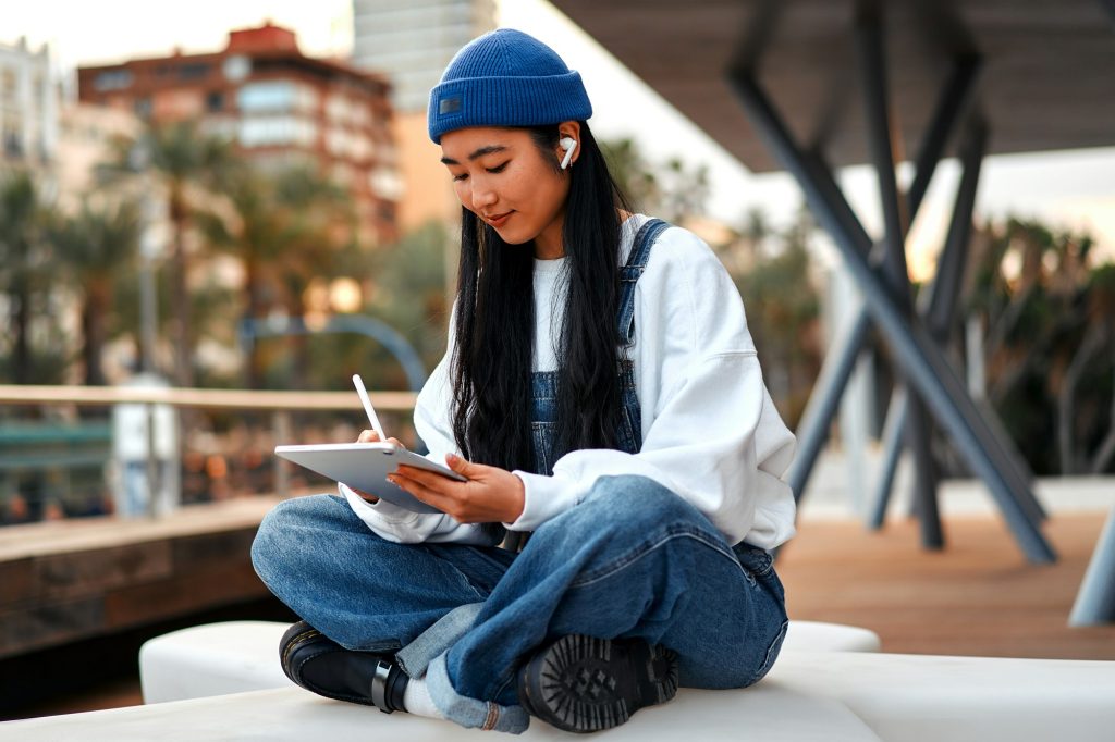 Asian woman blogger outdoors