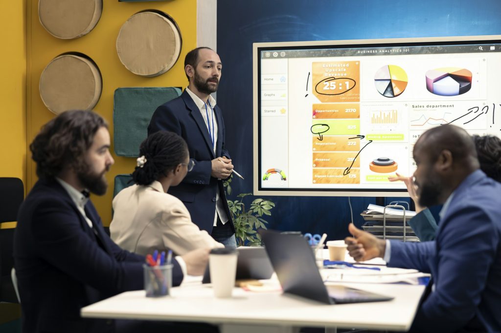 Marketing team attend an information sharing conference to verify updates