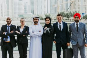 Mixed business team making agreements on future business plans