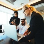 Mixed business team making agreements on future business plans. in the office