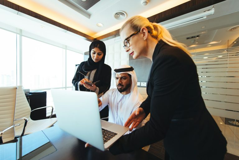 Mixed business team making agreements on future business plans. in the office