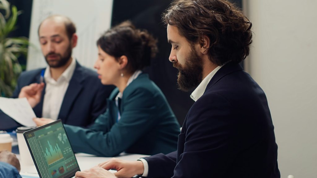 Pleased happy manager celebrating victory and kissing his employee