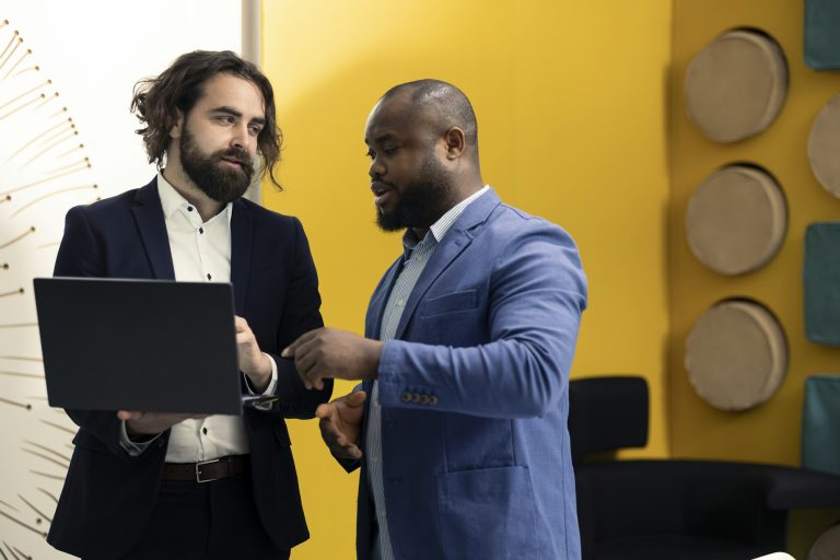 Team of corporation employees preparing their pitch for the shareholders meeting