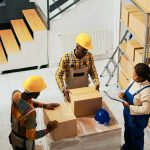 African american people packing products in boxes