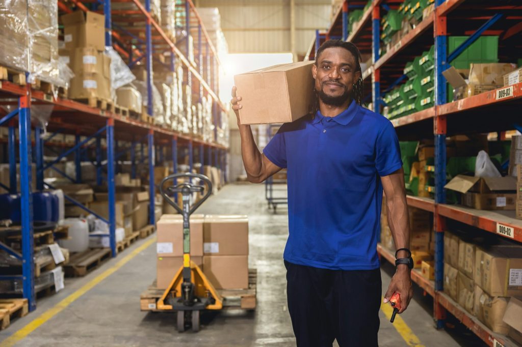 African black people worker happy working in factory warehouse inventory logistics industry employee
