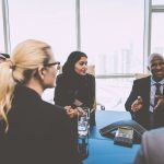 Mixed business team making agreements on future business plans. in the office